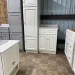 White bathroom vanity cabinets with raised panel doors and drawers | Jabara's